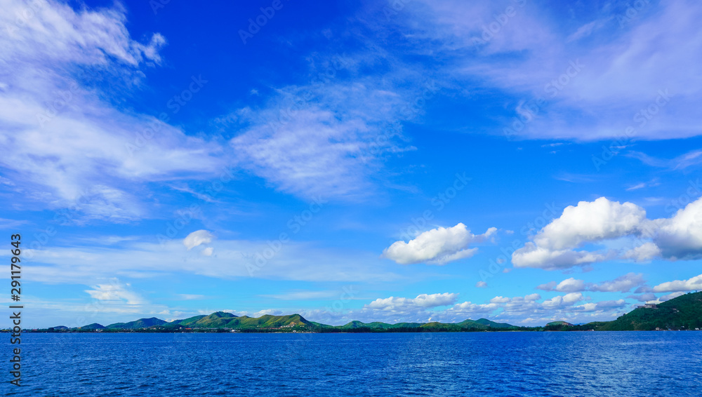 landscape of sea and island and beautiful cloudy during the sunny day.