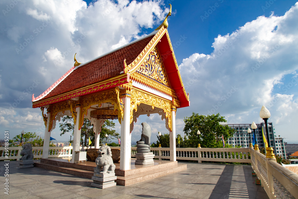 Thailand. Buddhist temple. Religious building. The Attractions Of Pattaya. Religion Buddhism. Artful carving of a Buddhist temple. Red, gold and white colors.