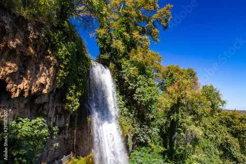 Greece. Waterfalls in Edessa. Rich nature of Greece. Water flows from the mountain. Rich vegetation. Mediterranean landscape. Holidays in Greece. The sights of the city of Edessa.