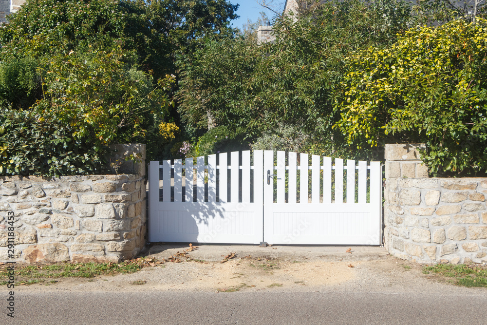 Gate of a property in white plastic Gate of a property in white plastic