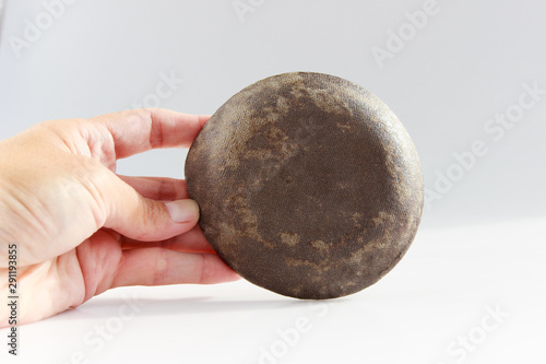 small plate in the shape of a dragon's eye is made using the technique of mixing two clays of Nerikomi. photo