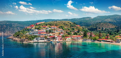 Fantastic morning cityscape of Asos village on the west coast of the island of Cephalonia, Greece, Europe. Wonderful spring sescape of Ionian Sea. Traveling concept background.