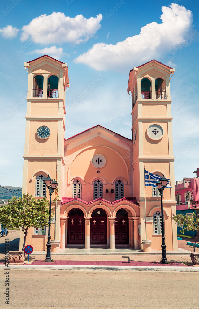 Fototapeta premium Picturesque morning view of Pantokrator Church. Bright spring cityscape of Lixouri town. Splendid outdoor scene of Kefalonia island. Architecture traveling background.