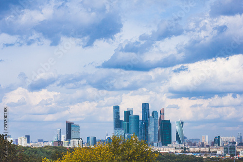 Panoramic view of the city of Moscow from the Sparrow Hills  Russia. Mirror skyscrapers of the Moscow City business center against a blue sky