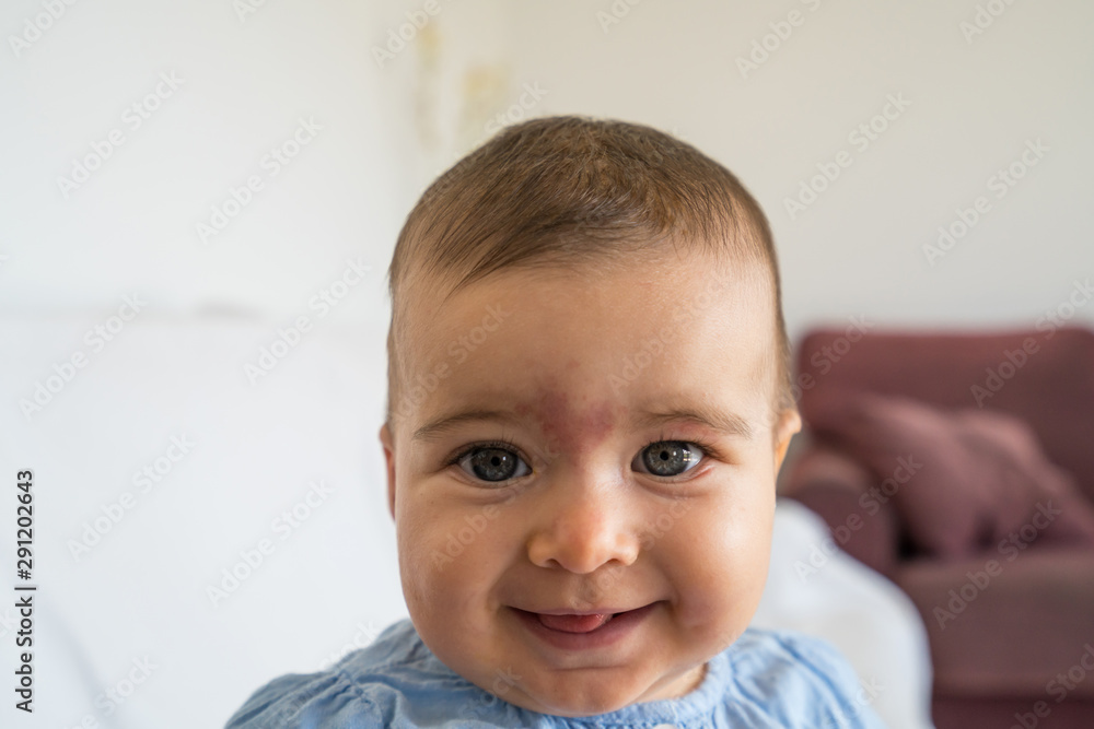 Happy and smiling baby of 7 months, looks at the camera. Happy and smiling baby of 7 months, looks at the camera.