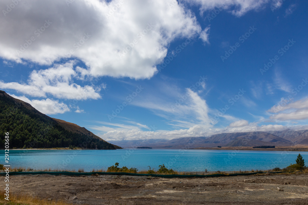 view of Tekapo lake on a sunny day, New Zealand