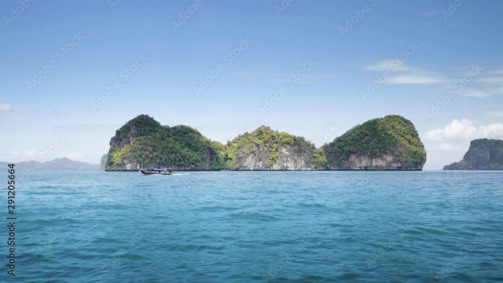 traditional boat and small islands in Krabi province, Thailand traditional boat and small islands in Krabi province, Thailand