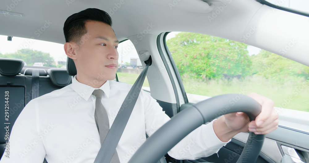 business asian man driving car