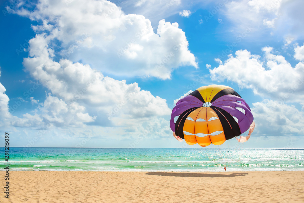 parachute at phuket beach thailand  and travel wallpaper with green water and gold sand