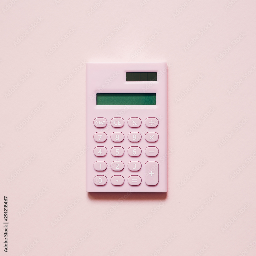 Pink digital calculator on pink background