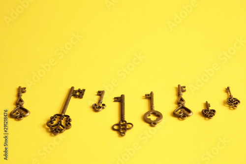 Different keys on yellow background. Choice and right solution concept