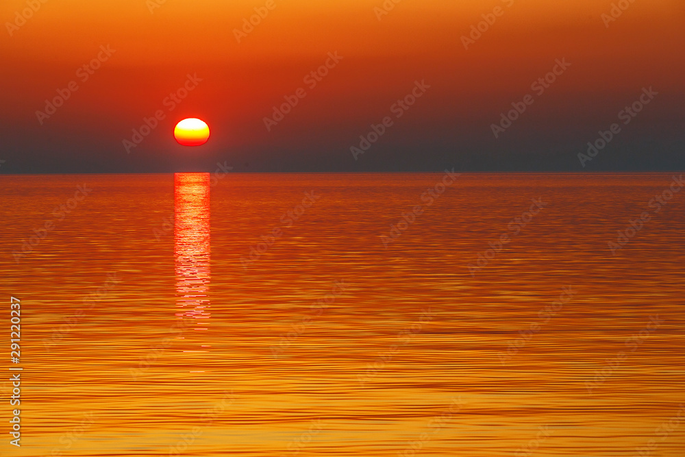 Picturesque golden sunset on the sea