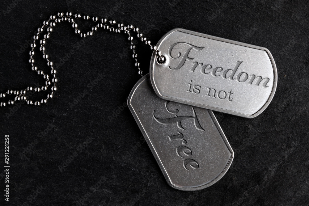Old military dog tags Freedom is not Free Stock Photo Adobe Stock