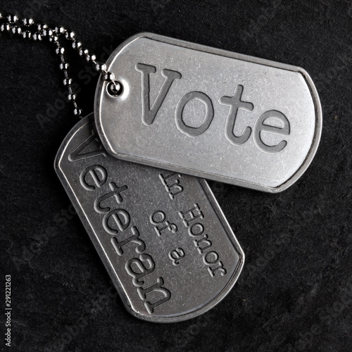 Old military dog tags - Vote in Honor of a Veteran