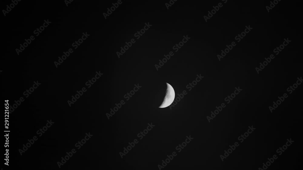 Pretty Half Moon On Early Cloudy Night With Dark Sky At Late Evening In England Nottingham Pretty Half Moon On Early Cloudy Night With Dark Sky At Late Evening In England Nottingham