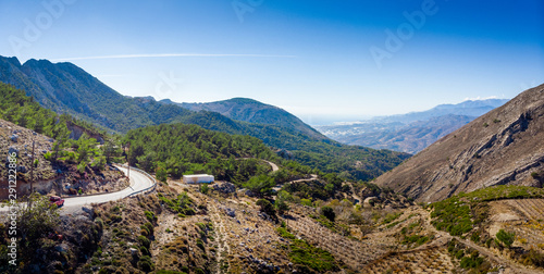 Tableau sur toile Aerial view of mountain road against sky