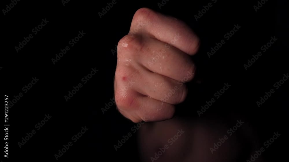Slow motion - Boxer fighter punching the camera, sweating and training boxing Slow motion - Boxer fighter punching the camera, sweating and training boxing