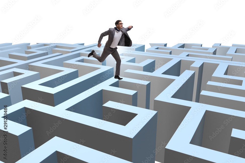 Businessman trying to escape from maze Businessman trying to escape from maze