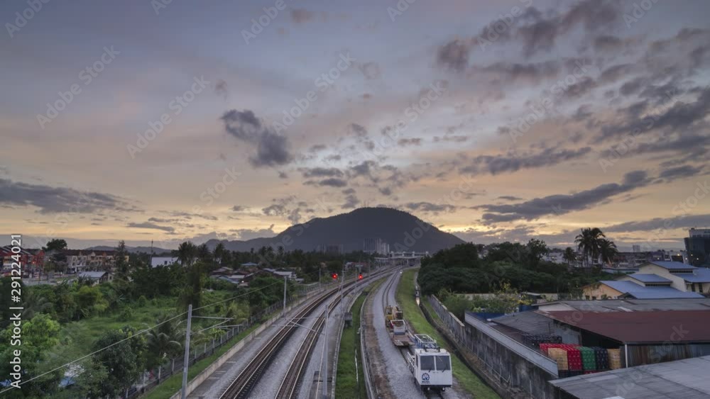 Timelapse colorful red sunrise of over the railway road at station KTM Bukit Mertajam, Timelapse colorful red sunrise of over the railway road at station KTM Bukit Mertajam,