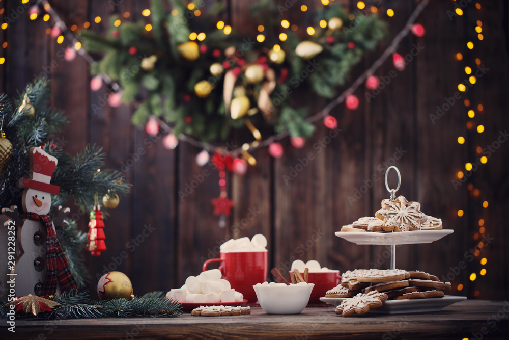 Christmas cookies on wooden table in kitchen