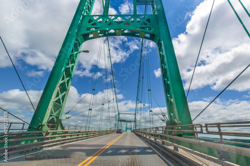 Saint Lawrence River bridge crossing from 1000 islands in Ontario, Canada to USA, New York © eskystudio