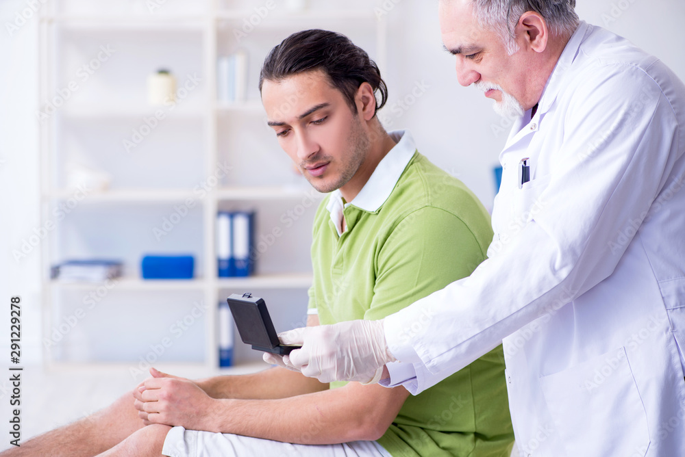 Male patient with hearing problem visiting doctor otorhinolaryng Male patient with hearing problem visiting doctor otorhinolaryng