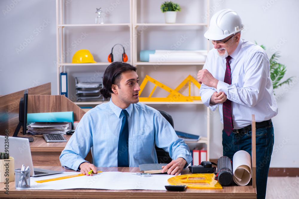 Two architects working on the project Two architects working on the project