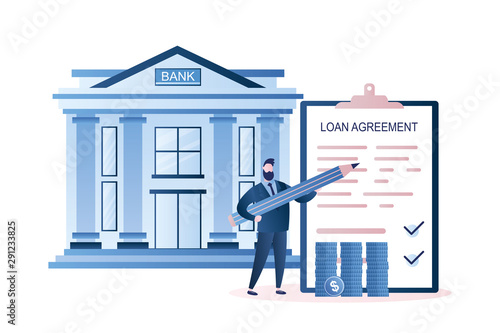 Businessman with big pencil,coins stacks and loan agreement paper, bank building on background.