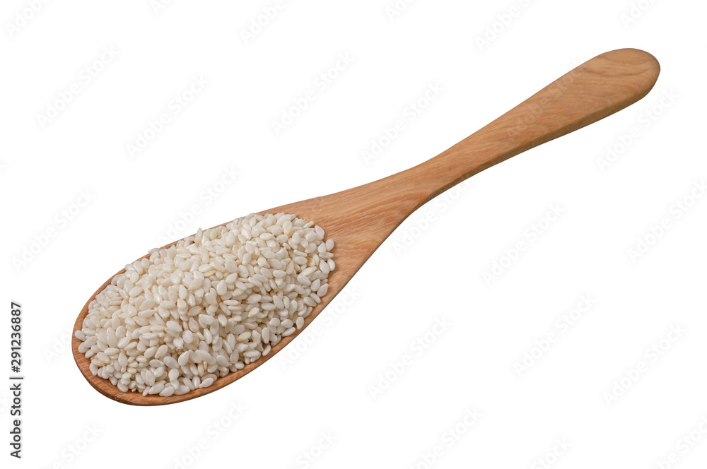 white sesame seeds in wooden spoon isolated on white background. L.Herb. white sesame seeds in wooden spoon isolated on white background. L.Herb.