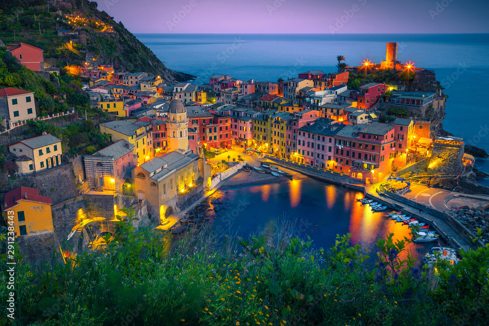 Stunning fishing village with colorful houses at evening, Vernazza, Italy