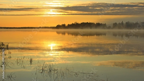 wonderful morning, honey sunrise, light haze of fog, reflection in the water ... amazing colors !!!