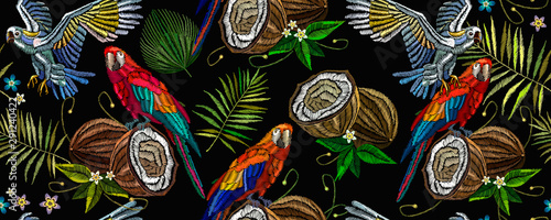 Embroidery. Tropical art. Parrots, palm leaves, pineapple and coconut horizontal seamless pattern Fashionable jungle, hot summer background. Template for design of clothes