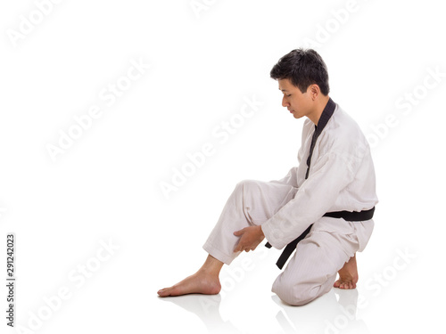 Male martial artist getting ready to practice