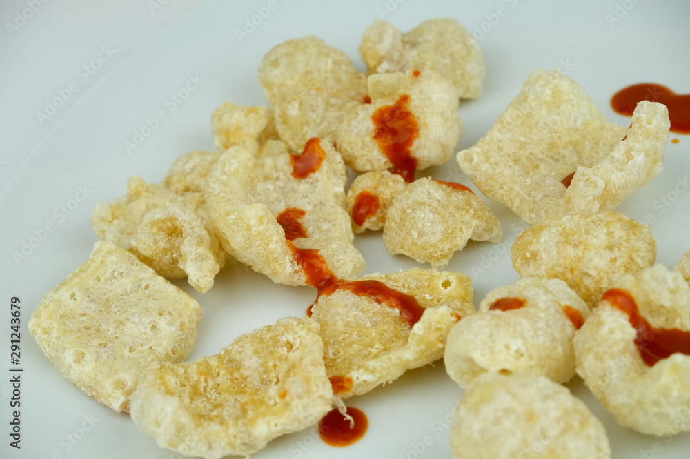 Crispy Pork Skin , Pork rinds also known as chicharrones sprinkledd