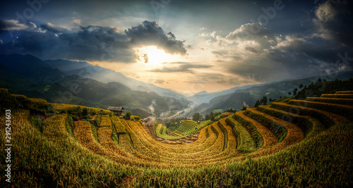 Terraced rice fields that resemble the letter U. Sunset evening light and low light. at Mu Cang Chai in Vietnam.