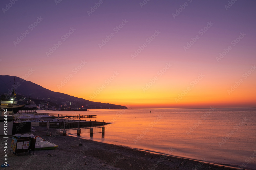 Beautiful sunrise over the Black Sea in Yalta, Crimea.