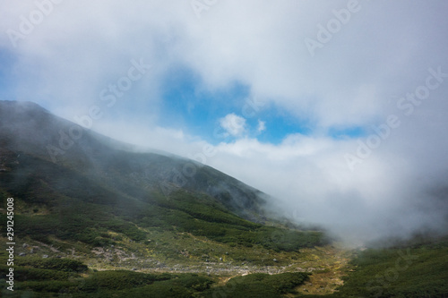 Mt. Norikura wrapped in clouds in Nagano, Japan