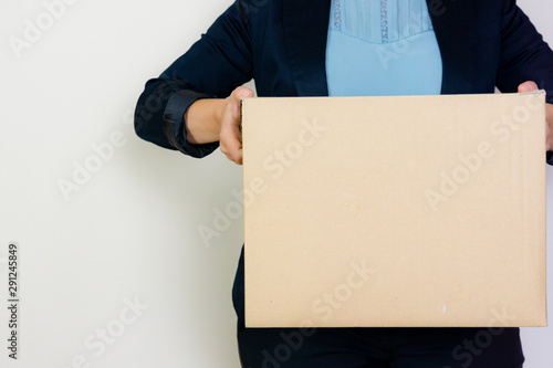 Woman holding box on white background