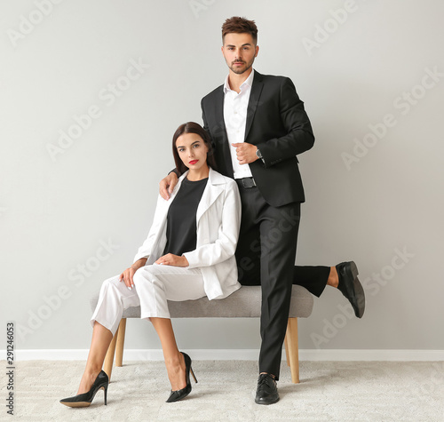 Stylish young couple near w...