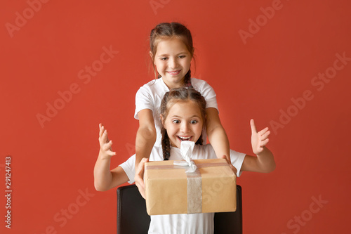 Cute girl greeting her sist...