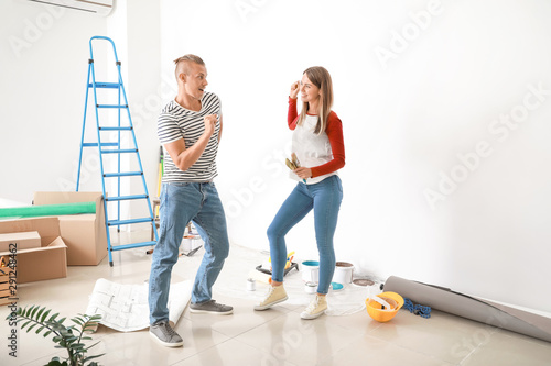 Happy young couple dancing ...