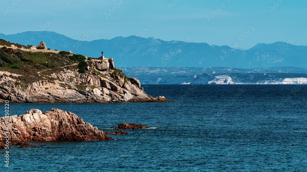 Seascape near Santa Teresa Gallura, Sardinia, Italy. In the background limestone cliff of Corsica.