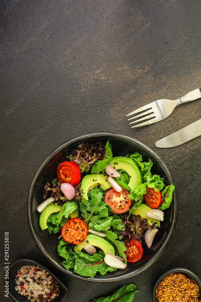 healthy salad avocado, vegetables, mix leaves, salad dressing (tasty and healthy food) menu concept. food background. copy space. Top view healthy salad avocado, vegetables, mix leaves, salad dressing (tasty and healthy food) menu concept. food background. copy space. Top view