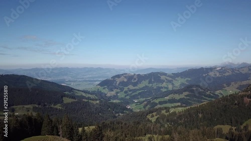 Lush greenery peak landscape of Sattelegg pass mountain, wide panning shot  photo