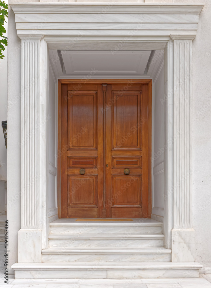 contemporary elegant house entrance solid wood door and white marble walls contemporary elegant house entrance solid wood door and white marble walls