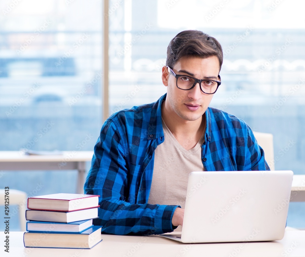 Student in telelearning distance learning concept reading in lib Student in telelearning distance learning concept reading in lib