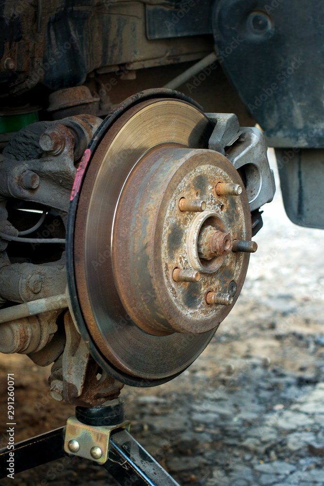The hub of the car closeup. Car repair The hub of the car closeup. Car repair