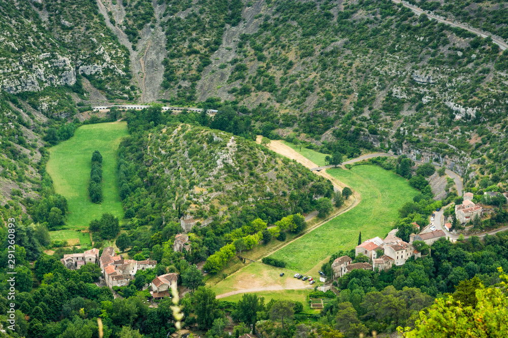 The village of Navacelles and the natural cirque created by the old meander of the Vis river