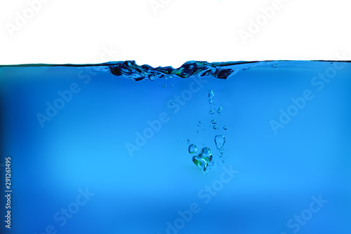 blue water surface with splash with bubbles of air