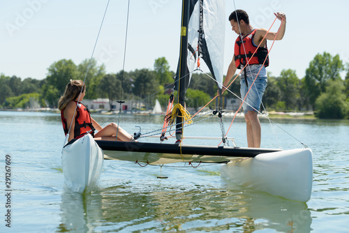 a young couple is sailing